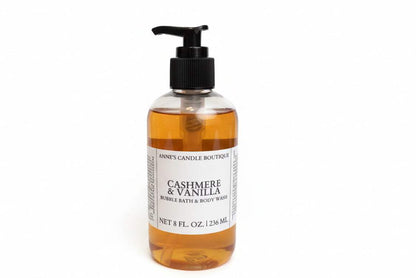 Bottle of 'Cashmere & Vanilla' bubble bath with pump on a white background