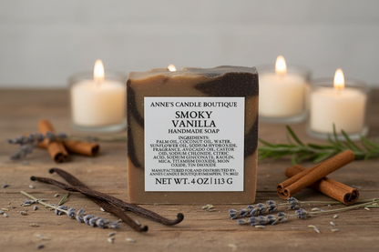 Handmade soap bar from Anne's Candle Boutique with candles and spices on a wooden surface.