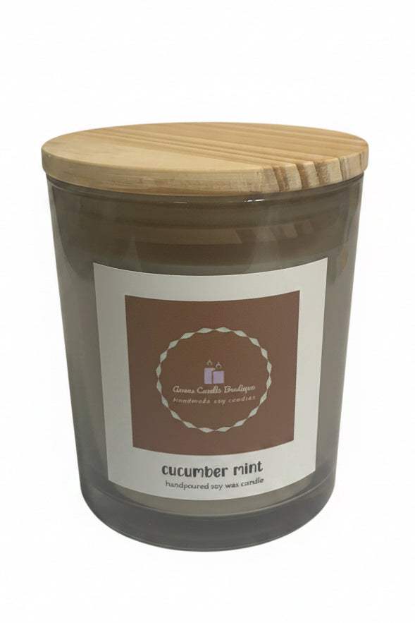 Candle with wooden lid and label on a white background